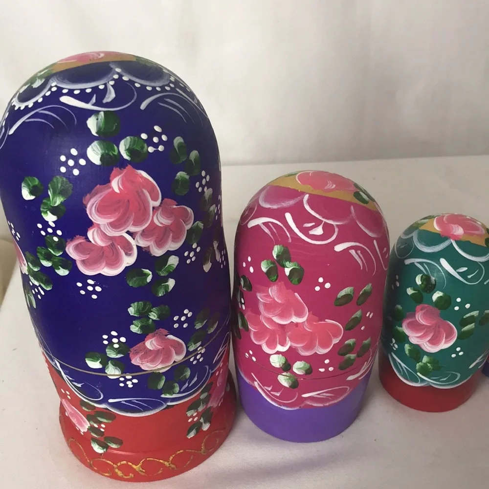 Beautifully decorated nesting dolls set
